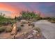 Front yard with long driveway and desert landscaping at 8300 E Dixileta Dr # 253, Scottsdale, AZ 85266