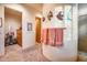 Bathroom with a shower and soaking tub with decorative tile and art at 8300 E Dixileta Dr # 253, Scottsdale, AZ 85266