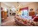 Relaxing primary bedroom with fireplace, sitting area, and access to patio at 8300 E Dixileta Dr # 253, Scottsdale, AZ 85266