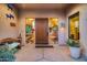 Entryway with stained-glass windows and wooden door at 8300 E Dixileta Dr # 253, Scottsdale, AZ 85266