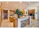 Bright kitchen with an island, wood cabinets, and recessed lighting at 8300 E Dixileta Dr # 253, Scottsdale, AZ 85266