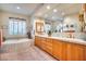 Spa-like bathroom with double vanity, soaking tub, and updated fixtures at 8300 E Dixileta Dr # 253, Scottsdale, AZ 85266