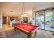 Game room with a pool table and views to the backyard at 8300 E Dixileta Dr # 253, Scottsdale, AZ 85266