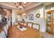 Elegant dining room with a large table, chandelier and built-in hutch at 8300 E Dixileta Dr # 253, Scottsdale, AZ 85266
