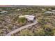 Aerial view of home with desert landscape and mountain views at 8300 E Dixileta Dr # 253, Scottsdale, AZ 85266