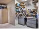 Organized garage with ample storage cabinets and shelving at 8300 E Dixileta Dr # 253, Scottsdale, AZ 85266