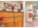 Bathroom boasts a large vanity, soaking tub, and decorative wall art at 8300 E Dixileta Dr # 253, Scottsdale, AZ 85266