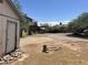 Backyard with shed, gravel, and trees at 1522 W Fillmore St, Phoenix, AZ 85007