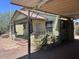 Side view of the house with carport and landscaping at 1522 W Fillmore St, Phoenix, AZ 85007