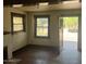 Living room with hardwood floors and view of the front yard at 1522 W Fillmore St, Phoenix, AZ 85007