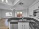 Modern kitchen with granite countertops and stainless steel appliances at 10030 W Indian School Rd # 257, Phoenix, AZ 85037