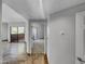 Bright hallway with tile flooring and access to other rooms at 10030 W Indian School Rd # 257, Phoenix, AZ 85037