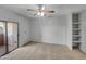 Bright bedroom with large window and built in shelves at 10030 W Indian School Rd # 257, Phoenix, AZ 85037