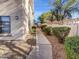 Well maintained path leading to the community at 10030 W Indian School Rd # 257, Phoenix, AZ 85037