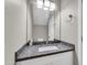 Bathroom with granite vanity and updated fixtures at 21655 N 36Th Ave # 104, Glendale, AZ 85308