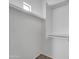 Large walk-in closet with double hanging rods at 21655 N 36Th Ave # 104, Glendale, AZ 85308