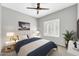 Spacious bedroom with a comfortable bed and modern decor at 21655 N 36Th Ave # 104, Glendale, AZ 85308