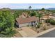 Single story house with driveway, landscaping, and mountain views at 2320 E Shangri La Rd, Phoenix, AZ 85028