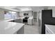 Modern kitchen with island and stainless steel appliances at 2320 E Shangri La Rd, Phoenix, AZ 85028