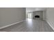 Living room with fireplace and wood-look floors at 2320 E Shangri La Rd, Phoenix, AZ 85028