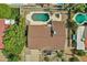 Aerial view showcasing house, pool, and surrounding landscape at 2320 E Shangri La Rd, Phoenix, AZ 85028