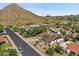 Aerial view of house with pool and mountain backdrop at 2320 E Shangri La Rd, Phoenix, AZ 85028