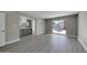 Bright bedroom with gray floors and access to a patio at 2320 E Shangri La Rd, Phoenix, AZ 85028