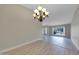 Dining room with chandelier and wood-look flooring at 2320 E Shangri La Rd, Phoenix, AZ 85028