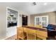 Dining area with built-in shelving and kitchen view at 1360 W 15Th St, Tempe, AZ 85281