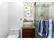 Clean bathroom with a vessel sink and walk-in shower at 1360 W 15Th St, Tempe, AZ 85281