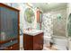 Bathroom with tub, shower, and updated vanity at 1360 W 15Th St, Tempe, AZ 85281