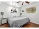 Main bedroom with king-size bed and hardwood floors at 1360 W 15Th St, Tempe, AZ 85281