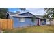 Charming blue house with a red door and wood fence at 1360 W 15Th St, Tempe, AZ 85281