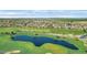Community overview with golf course and lake at 120 E Camellia Way, San Tan Valley, AZ 85140
