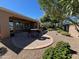 Patio area with seating for two at 120 E Camellia Way, San Tan Valley, AZ 85140