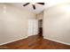Hardwood floor bedroom with access to bathroom at 120 E Camellia Way, San Tan Valley, AZ 85140