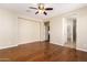 Spacious bedroom with hardwood floors and access to bathroom at 120 E Camellia Way, San Tan Valley, AZ 85140