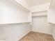 Large walk-in closet with double hanging rods and shelving at 120 E Camellia Way, San Tan Valley, AZ 85140
