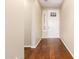 Bright entryway with hardwood floors and white door at 120 E Camellia Way, San Tan Valley, AZ 85140