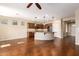 Kitchen with island, hardwood floors, and views to living room at 120 E Camellia Way, San Tan Valley, AZ 85140