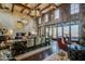 Spacious lobby with high ceilings, stone walls, and large windows at 120 E Camellia Way, San Tan Valley, AZ 85140