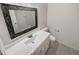 Bathroom with white vanity, mosaic mirror, and tub at 3511 E Baseline Rd # 1031, Phoenix, AZ 85042