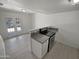 Modern kitchen with gray countertops and white cabinets at 3511 E Baseline Rd # 1031, Phoenix, AZ 85042