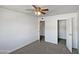 Bright bedroom featuring carpet and ceiling fan at 3511 E Baseline Rd # 1031, Phoenix, AZ 85042