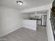 Small kitchen with white cabinets and stainless steel appliances at 3511 E Baseline Rd # 1031, Phoenix, AZ 85042