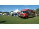 Community event with food trucks and attendees at 1438 W Coral Reef Dr, Gilbert, AZ 85233