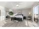 Large bedroom with ensuite bathroom and mirrored closet doors at 1438 W Coral Reef Dr, Gilbert, AZ 85233
