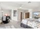 King-size bed, large TV, and access to another room at 1438 W Coral Reef Dr, Gilbert, AZ 85233