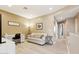 Bright home office features built-in desk and comfortable seating at 1438 W Coral Reef Dr, Gilbert, AZ 85233