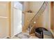 Bright entryway with a curved staircase and seating area at 1438 W Coral Reef Dr, Gilbert, AZ 85233